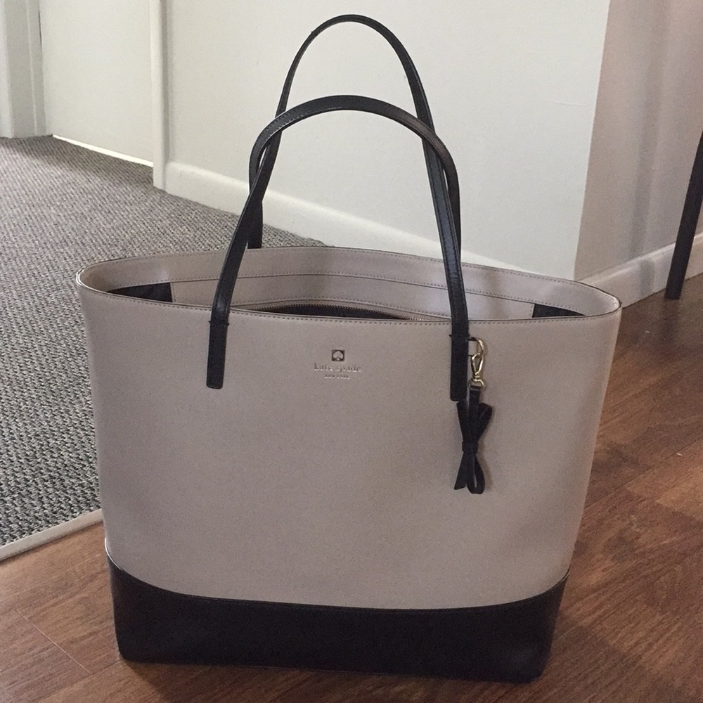 Taupe and black Kate Spade tote.
